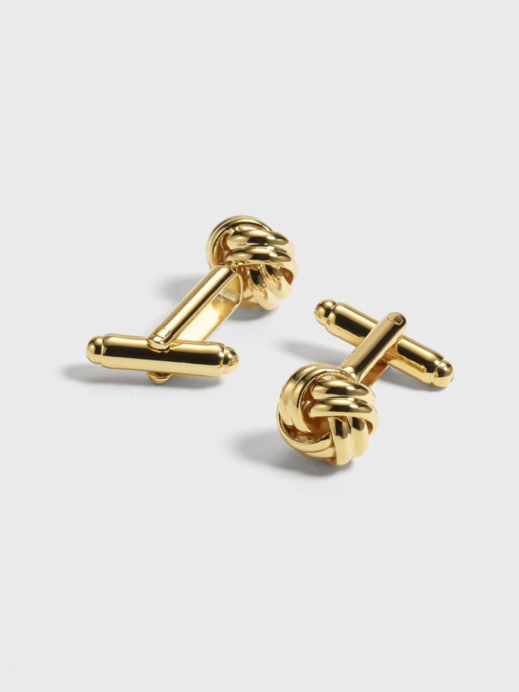 Go for gold. If you're looking for a subtle way to add a little flash to your look, these cufflinks with a refined knot design are a clear winner. Polished brass Bullet back closure Men Brooch, Knot Cufflinks, Tuxedo Styles, Suit Prom, Designer Cufflinks, Men's Brooch, Going For Gold, Wedding Plan, Black Tux