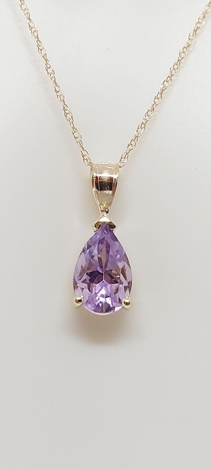 "Drop 9x5mm AMETHYST 14k Yellow Gold Pendant / Necklace. 3.18ct Natural stone. 18\" gold Chain necklace. Tear Drop Gemstone Jewelry. Amethyst. February Birthday Stone. Astrology. Gift for her. Zodiac. Product Info: - Stone: Drop Amethyst. - Color: Purple. - Pendant Measures: 15mm x 5mm. - Stone Measures: 9x5mm - Stone Carat: 3.18ct - Metal: 14k Yellow Gold. - Chain Length: 18 inches Rope Chain. - Made in USA. - Nice Gift Box Included." Purple Jewelry Necklace, Amethyst Jewelry Necklace, Amethyst Earrings Gold, Purple Stone Necklace, Purple Pendant, Birthday Stone, Pretty Jewelry Necklaces, February Birthday, Astrology Gift