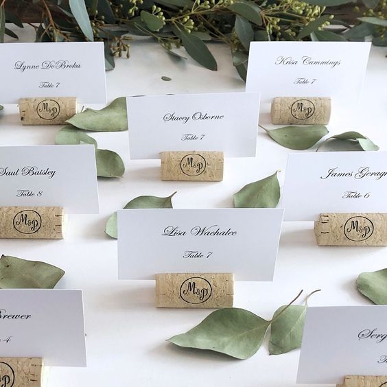 place cards are placed on top of wine corks