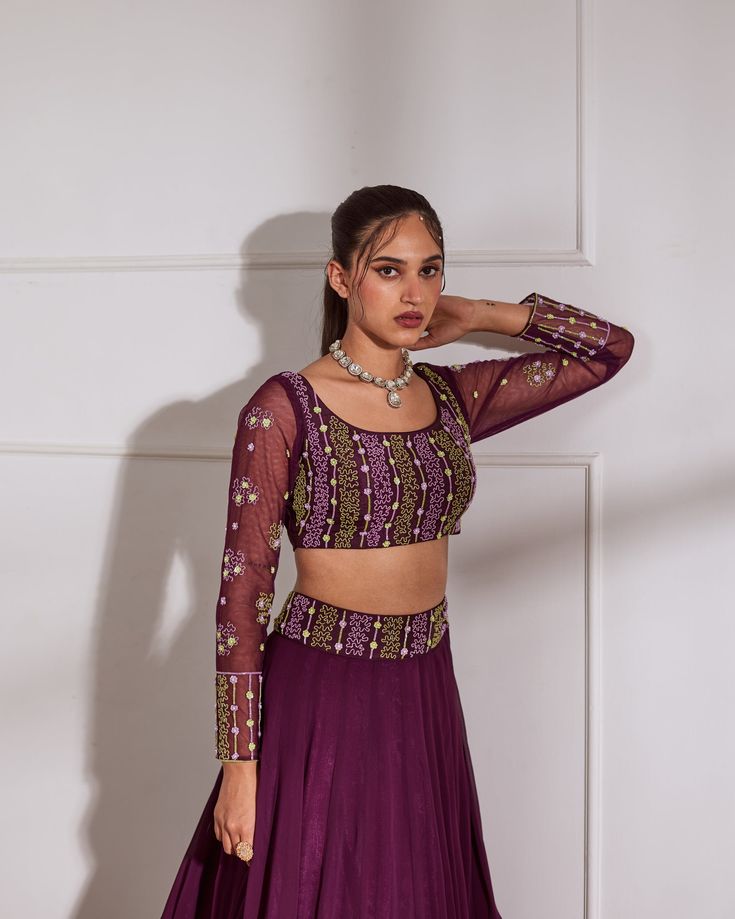 Wine fully embroidered choli with net sleeves paired with inserted kali lehenga and wine net dupatta. No. of pieces in a set: 3 Color: Wine Fabric Composition: Opada silk, net georegette Lining Material: Shantoon Closure used: Side zip in both choli and lehenga Dress Length : Full Silhouette: Kalidaar Neck type : Round neckline Sleeve Length: full Sleeves Waistline: High waist Prints/ Pattterns : Plain Delivery Time: 20-25 days Wine Lehenga, Kali Lehenga, Lehenga Dress, Shirt Jacket Men, Padded Blouse, Drape Saree, Embroidered Dupatta, Pattern Embroidery, Net Dupatta