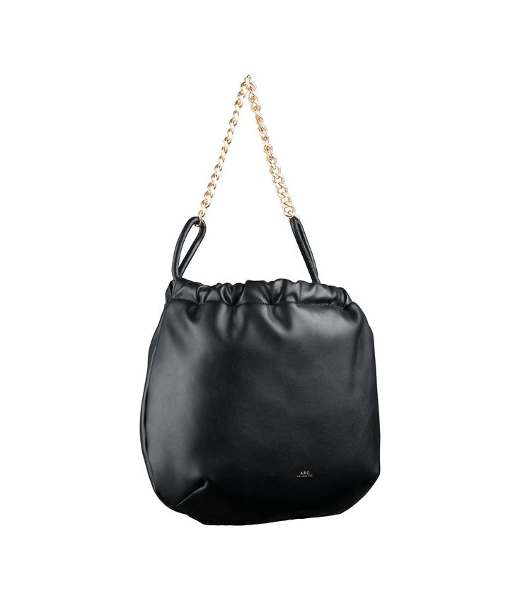 A.P.C. Women's bag. - Recycled leather-like material.- Magnetic inside closure.- Drawstring on top, connected to the handles.- Goldtone metal chain.- Can be carried by hand or on the shoulder.- One interior pocket. - Goldtone 'A.P.C. Rue Madame Paris' logo embossed on front.- In the Ninon product line. Everyday Crossbody Bag With Chain, Everyday Shoulder Bag With Chain, Chic Bucket Bag With Chain Strap For Travel, Modern Bags With Chain Strap And Double Handle, Daily Use Bag With Chain Strap And Top Handle, Evening Satchel Shoulder Bag With Chain, Chic Chain Satchel For Everyday Use, Chic Travel Bucket Bag With Chain Strap, Everyday Satchel Box Bag With Chain Strap