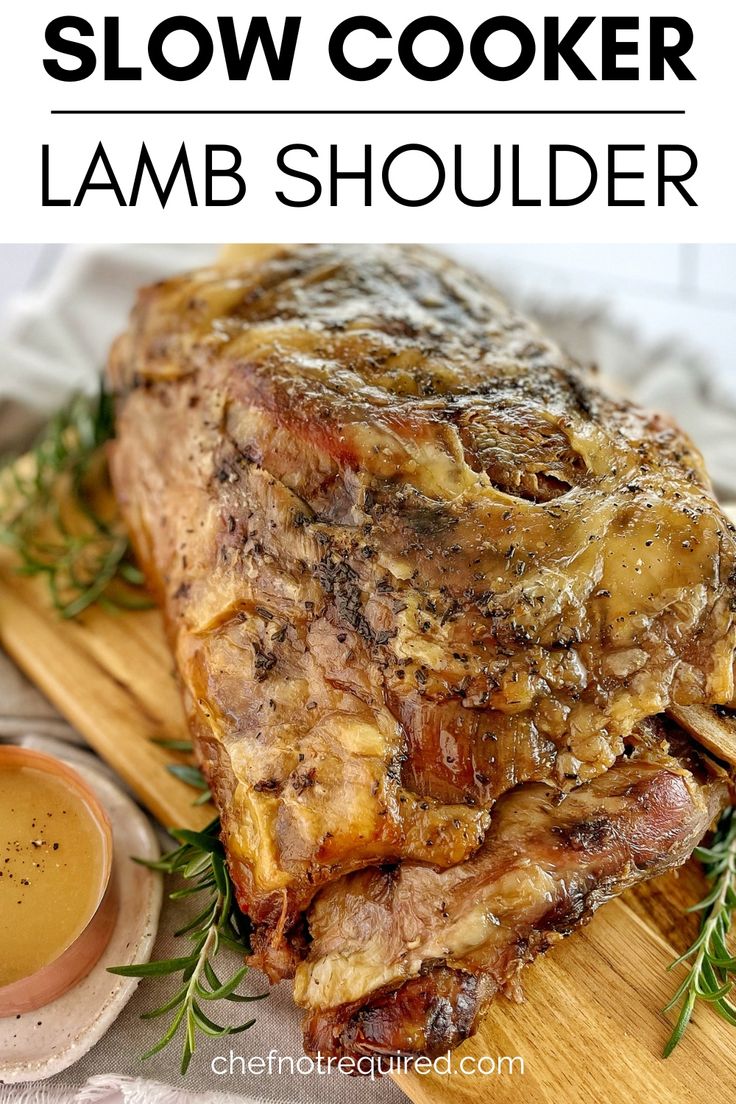 slow cooker lamb shoulder on a cutting board with sauce in the background and text overlay