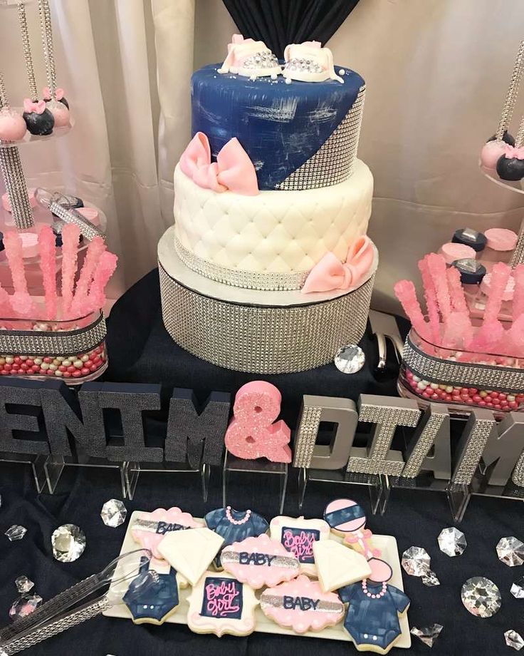 a table topped with lots of cakes and desserts