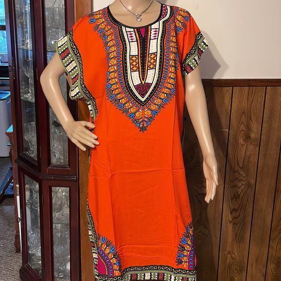 Beautiful Comfortable African Dashiki Midi Dress One Size Fits Most Color: Orange Custom Made For All Sizes With Or Without String Belt Casual Orange Kaftan For Vacation, Dashiki For Ladies, Short Sleeve Orange Dress For Festival, Orange Tunic Dress For Festival, Orange Short Sleeve Dress For Festivals, Dashiki For Ladies Plus Size, Orange Printed Tunic Kaftan, Paint Splatter Dress, Blue Wrap Dress