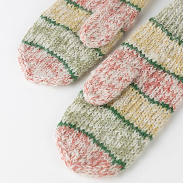 Sweet as can be, the Candy Shoppe Mittens are hand knit and ready to warm your hands on cold days. Keep a pair in the car for cool morning drives, at the ready by the door, or tucked in a hat ready to pull on. Beautifully handcrafted by artisans with Kumbeshwar Technical School in Kathmandu Valley, Nepal. Scandinavian Winter Handmade Knitting Pattern, Warm Multicolor Winter Knitting Pattern, Handmade Cozy Winter Knitting Pattern, Cozy Handmade Winter Knitting Pattern, Handmade Winter Knitting Pattern In Yarn, Handmade Yarn Knitting Pattern For Winter, Handmade Winter Knitting Pattern One Size, Comfortable Crochet Knitting Pattern For Winter, Casual Handmade Knitting Pattern For Cold Weather