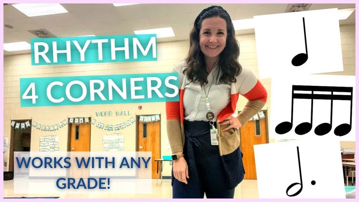 a woman standing in front of a sign that says rhythm 4 corners works with any grade