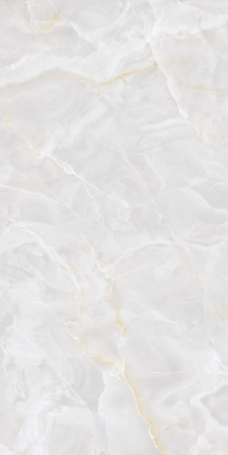 a white marble textured background with gold veining and lines on the edges, as seen from above