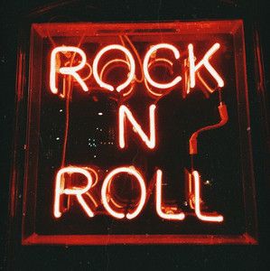 a neon sign that reads rock n roll