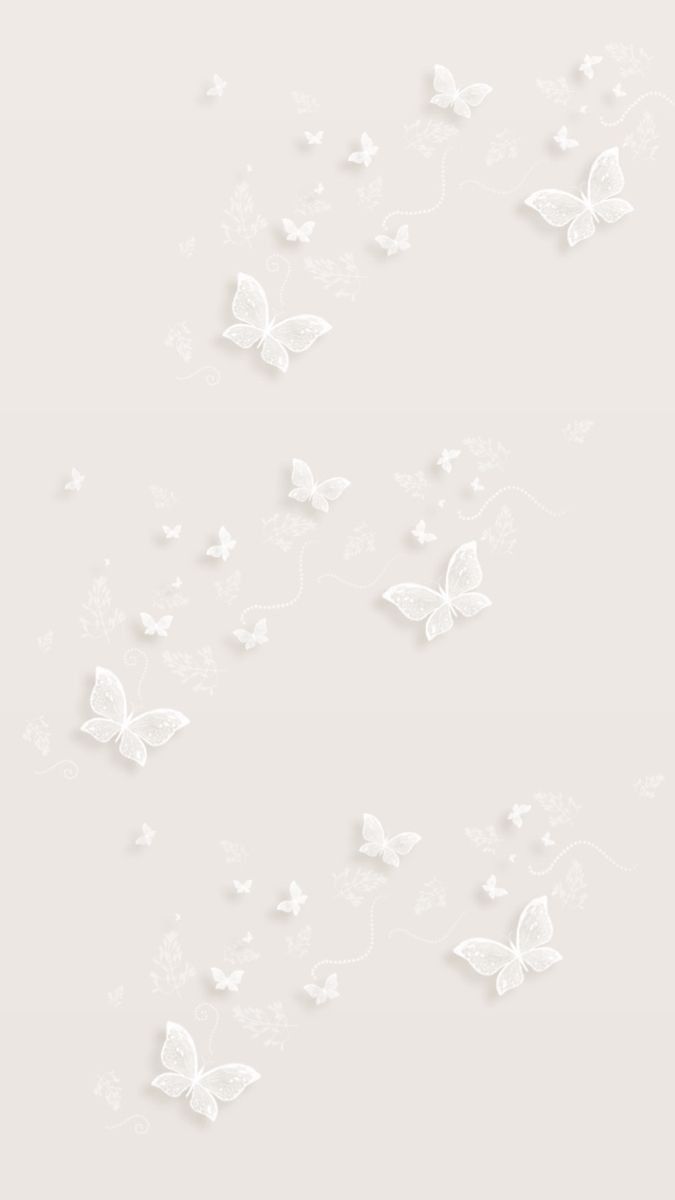 white butterflies flying in the air on a light gray background with space for your text