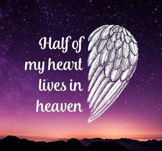 an angel wing with the words,'half of my heart lives in heaven '