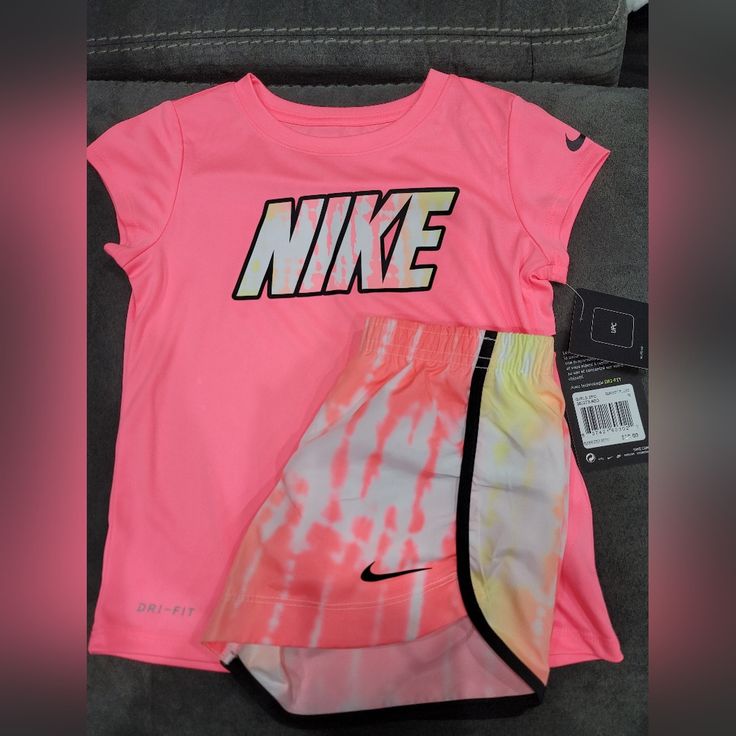 Nike Short And Tshirt Set, Size 6 Sporty Pink Top For Playwear, Sporty Pink Tops For Playwear, Cute Pink Sports Tops, Nike Sporty Pink T-shirt, Nike Pink Tops With Letter Print, Sporty Pink Nike T-shirt, Pink Nike Tops With Letter Print, Nike Pink T-shirt With Graphic Print, Pink T-shirt For Playwear In Spring