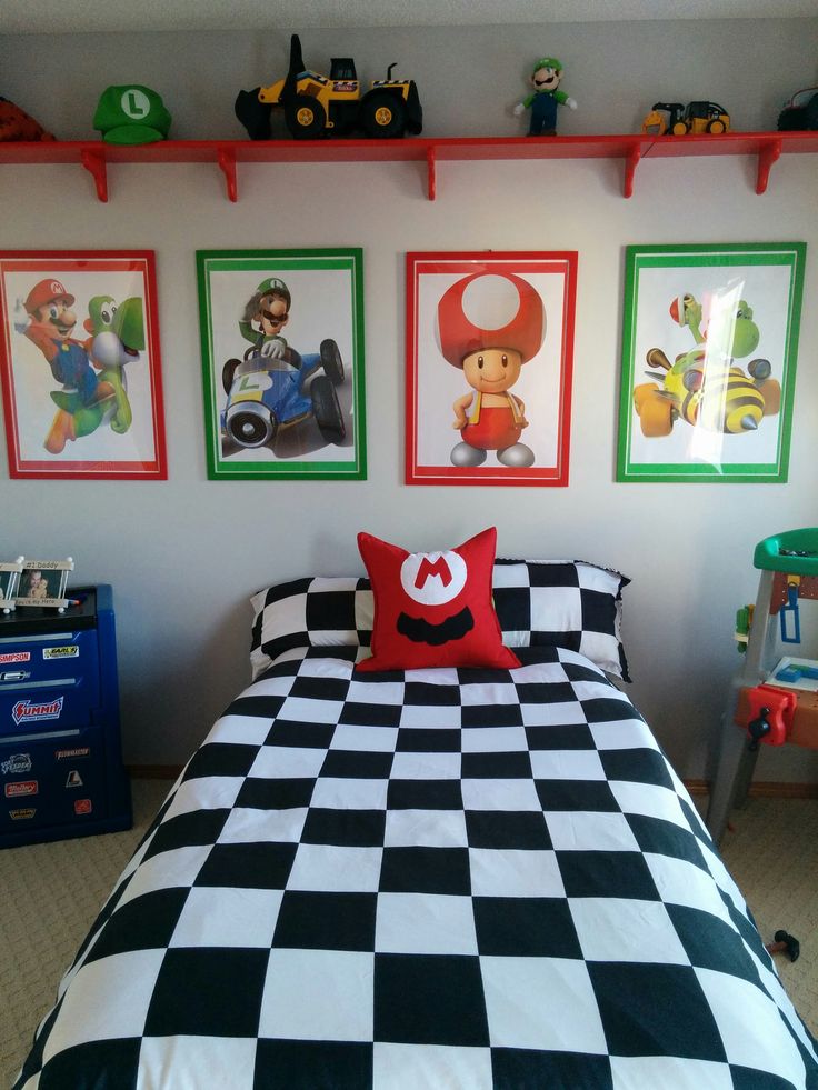 a bed with black and white checkered bedspread in a child's bedroom