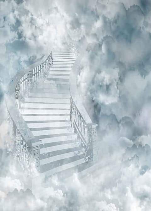 there is a stairway going up in the clouds