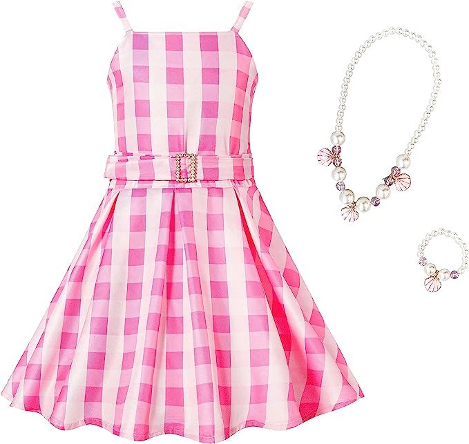 a pink and white checkered dress next to a necklace