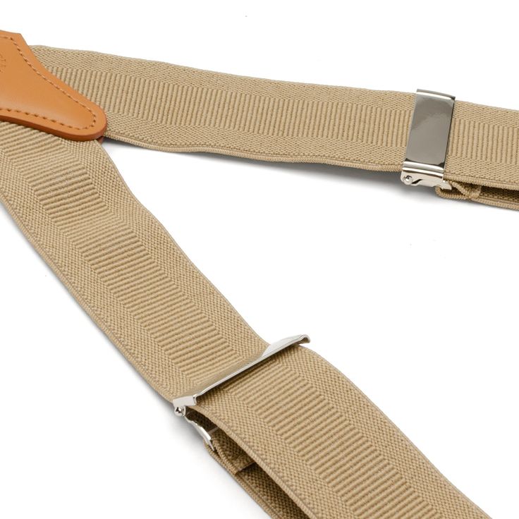 Look to tradition to create a modern, yet sophisticated style. Our Tan Clip Suspenders are designed to provide support without sacrificing comfort. The expert craftsmanship of our leather crosspatch suspenders do not restrict movement and will remain in place without slipping or having to adjust. Suspenders add a unique and versatile look that can be dressed up with a suit, or dressed down with jeans and a blazer. Classic Leather Belts And Suspenders With Adjustable Fit, Classic Adjustable Belt With Leather Strap, Classic Belts And Suspenders With Adjustable Strap For Everyday, Elegant Adjustable Belts And Suspenders For Work, Adjustable Leather Belts And Suspenders For Business, Classic Formal Belts And Suspenders With Adjustable Strap, Classic Belts And Suspenders With Adjustable Straps For Work, Classic Adjustable Belts And Suspenders For Work, Adjustable Brown Belts And Suspenders For Business