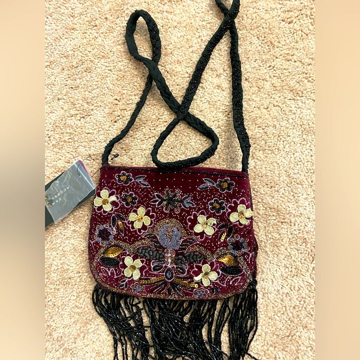 Very Beautiful Beaded Velvet Bag With Embroidered Floral Detail. Has Beading On The Strap And Beaded Fringed At The Bottom With Single Button Closure. Bohemian Evening Bag With Beaded Fringe, Bohemian Evening Bags With Beaded Fringe, Bohemian Embellished Bags For Formal Occasions, Purple Beaded Evening Bag, Elegant Beaded Bags For Festival, Bohemian Embellished Formal Bags, Bohemian Embroidered Shoulder Bag For Evening, Bohemian Embroidered Evening Shoulder Bag, Purple Embroidered Party Bag