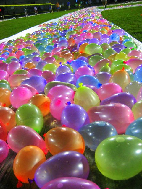 many balloons are lined up on the ground