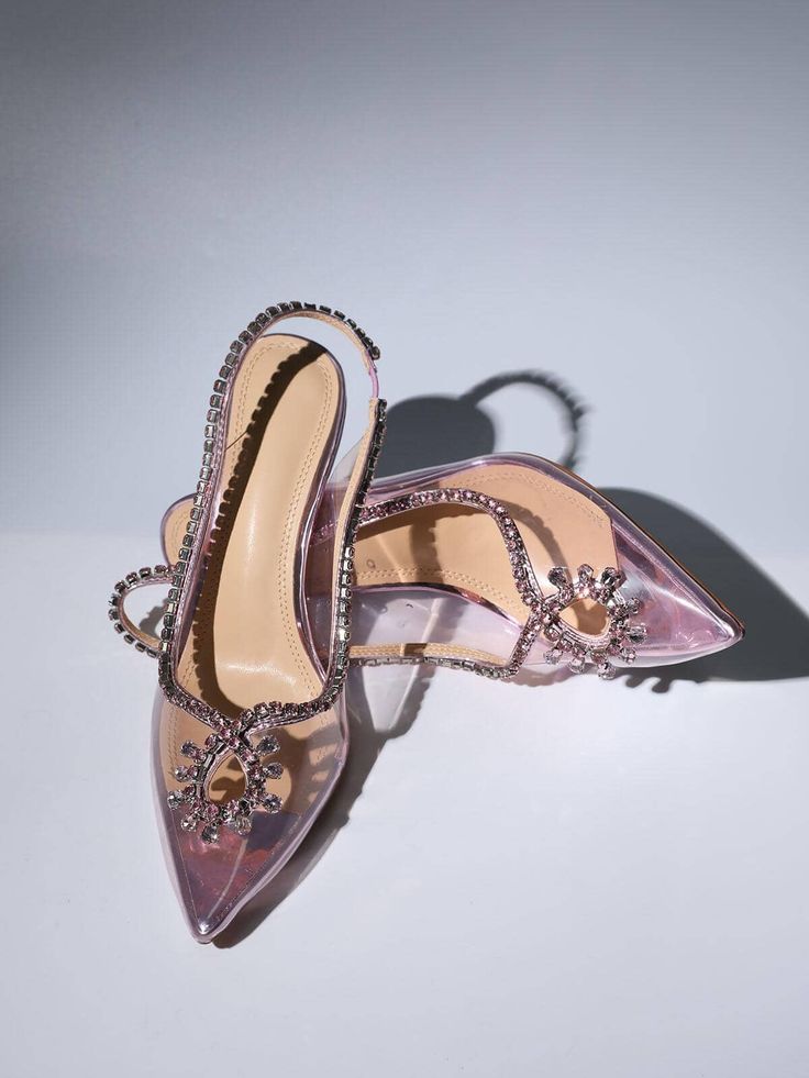 Make a glamorous entrance in the Crystal Cutout Embellished Pumps In Pink. They're made from pink PVC and edged with crystal-encrusted leather trims that form alluring cutouts at the vamps. Approx 8.5 cm / 3.3 inch heel Pointed toe Formal Heels With Rhinestone Rivets, Luxury Crystal-embellished Heels For Prom, Glamorous Pink Heels For Party, Chic Pink Heels With Rhinestones, Elegant Evening Heels With Rhinestone Rivets, Luxury Embellished Heels For Prom, Pink Rhinestone Pointed Toe Heels, Pink Heels With Rhinestones For Event, Pink Rhinestones Heels For Events