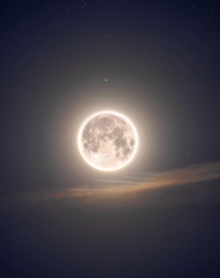 an image of the moon taken from earth in the night sky with stars and clouds