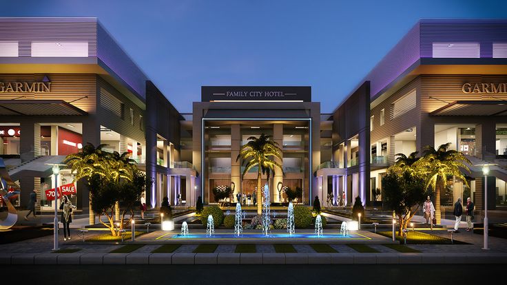 an image of a building that is lit up at night with palm trees in the foreground