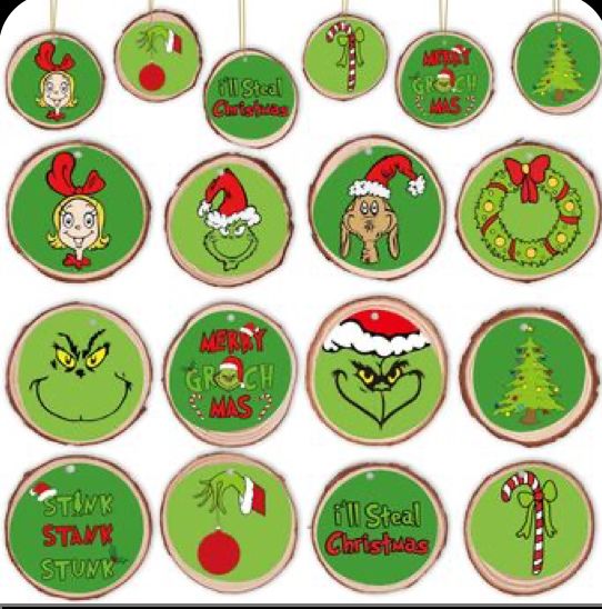 christmas cupcake toppers with the grin's face and other characters on them