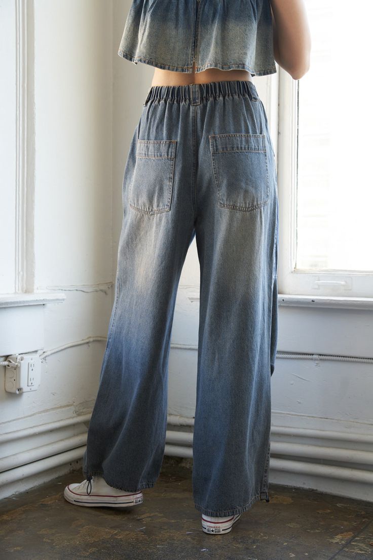 A washed denim pant featuring front closure, side pocket, wide leg, back elasticized waist, back pocket and bottom toggle pull tieDetails:Self : 100% Cotton Size & Fit- Model is 5`9" And Wearing Size Small- Measurements Taken From Size Small- Approx. Length: 44" Casual High Rise Pre-washed Bottoms, Wide Leg Washed Blue Flare Jeans With Belt Loops, Wide Leg Washed Blue Cargo Jeans With Belt Loops, Utility Style Wide Leg Washed Bottoms, Spring Pre-washed Wide Leg Jeans, Spring Wide-leg Pre-washed Jeans, Pre-washed Wide Leg Jeans For Spring, Spring Wide Leg Pre-washed Jeans, Casual Pre-washed Wide Leg Pants