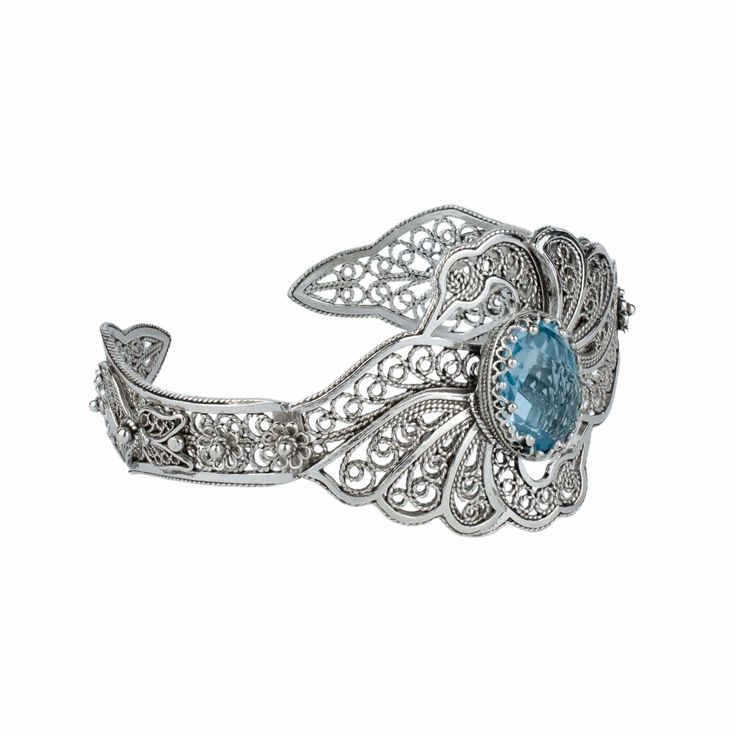 Blue Topaz Gemstone 925 Sterling Silver Artisan Crafted Filigree Art Double Swan Design Cuff Bracelet Swan Design, Gemstone Cuff Bracelet, Filigree Bracelet, Cuff Bracelets Handmade, Filigree Jewelry, Silver Polish, Blue Topaz Gemstone, Statement Ring Silver, Bracelet Blue