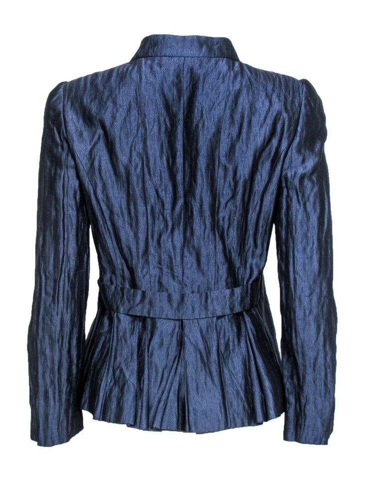 This dazzling piece is sure to turn some heads! Made with metallic silk, this Armani jacket is out of this world. Perfect for wearing with blouses and dress trousers, or over a bodycon dress -- however you wear this stunning piece is sure to add an Italian flair. Size 6 Made in Italy 88% Silk, 18% Metallic silk Front silver-toned button closures Slim fit design Upturned collar neckline Slightly padded shoulders Satin lining Waist 32" Bust 22" Total length 24" Armani Jacket, Silk Jacket, Armani Collezioni, Metallic Blue, Blue Silk, Satin Silk, Dress Trousers, Bodycon Dress, Blouses