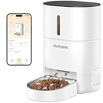 a dog food dispenser next to an iphone with the app on it