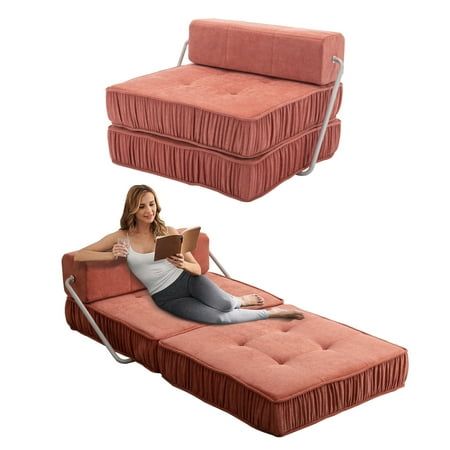 a woman sitting on top of a futon bed next to a chair with a mattress underneath it