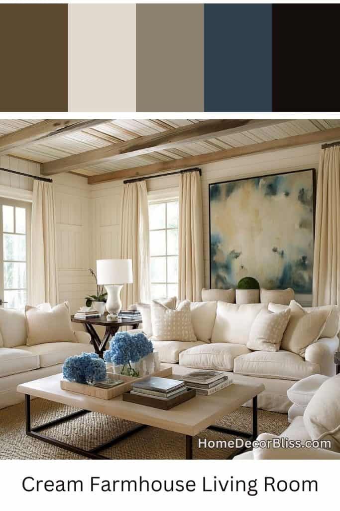 a living room filled with white furniture and blue flowers on the coffee table in front of two windows