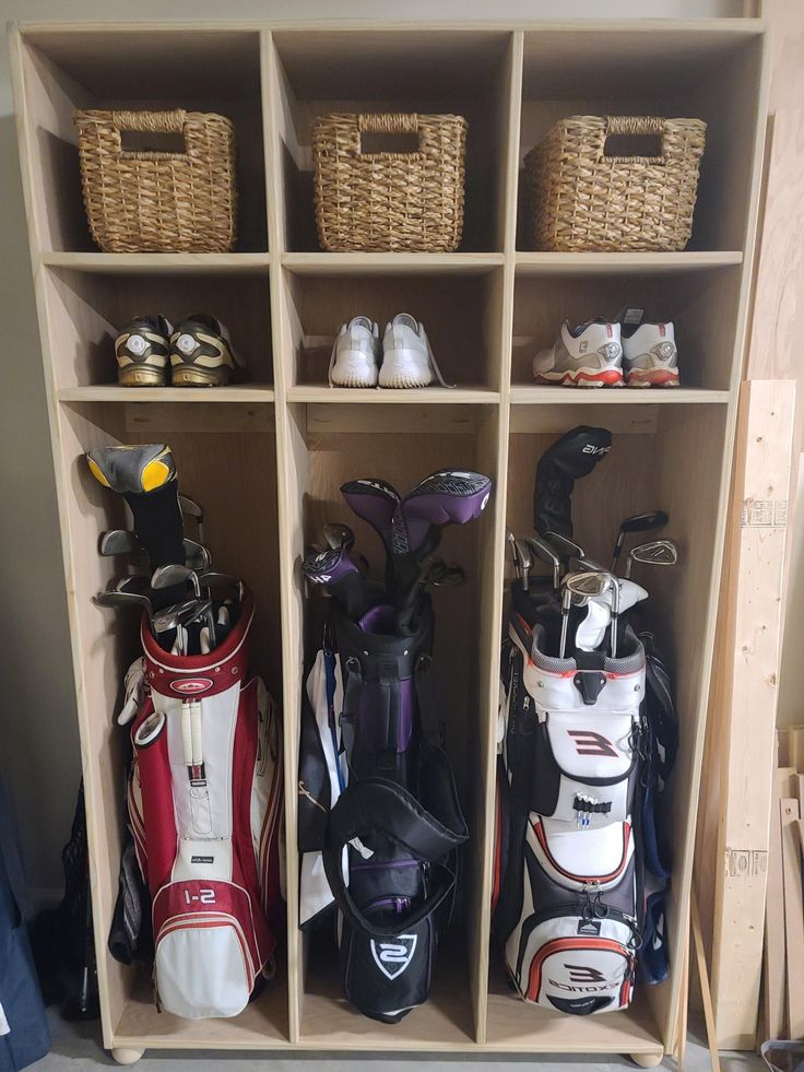 several different types of golf equipment in a storage area