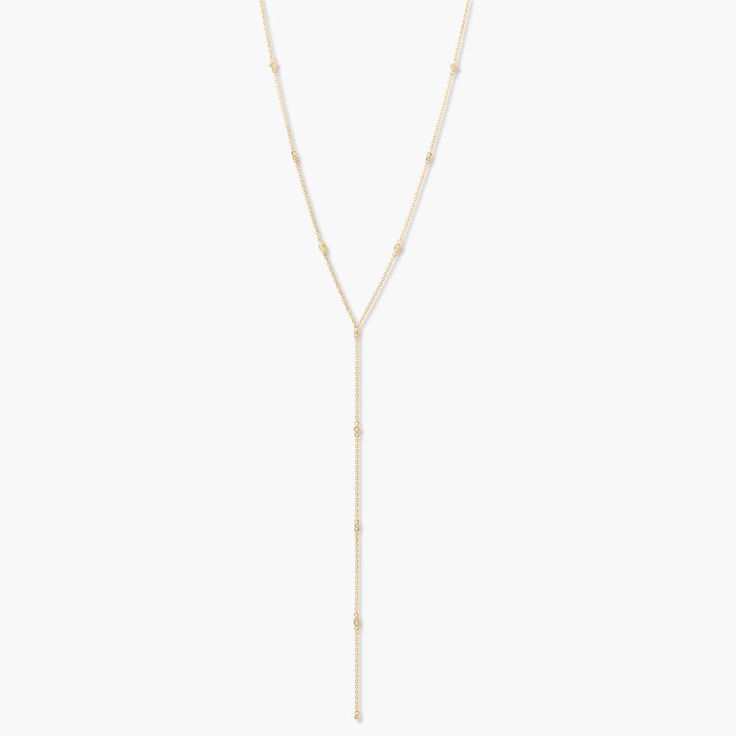 Brielle Vermeil Lariat Timeless Long Drop Lariat Necklace, Timeless Lariat Necklace With Adjustable Long Drop Chain, Chic Yellow Gold Lariat Necklace With Clavicle Chain, Minimalist Gold Lariat Body Chain, Timeless Long Drop Lariat Necklace With Adjustable Chain, Minimalist Delicate Lariat Body Chain, Chic Yellow Gold Lariat Necklace With Delicate Chain, Chic Lariat Jewelry With Adjustable Length, Minimalist Adjustable Lariat Body Chain