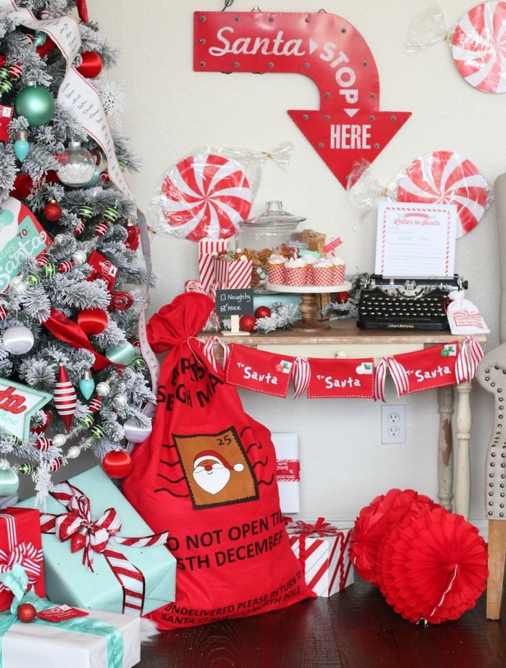 a christmas tree is decorated with candy canes and other holiday decorations in red, white and green