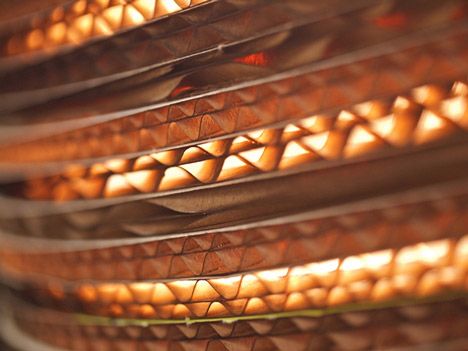 a close up view of the inside of a heater that is glowing orange and yellow