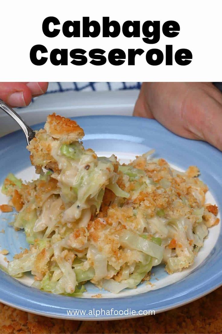 a blue plate topped with cabbage casserole covered in cheese