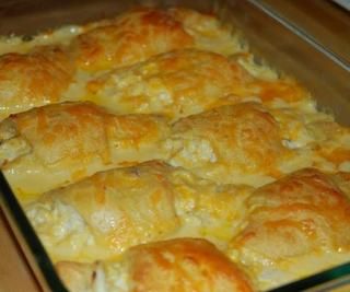 a casserole dish filled with cheesy potatoes