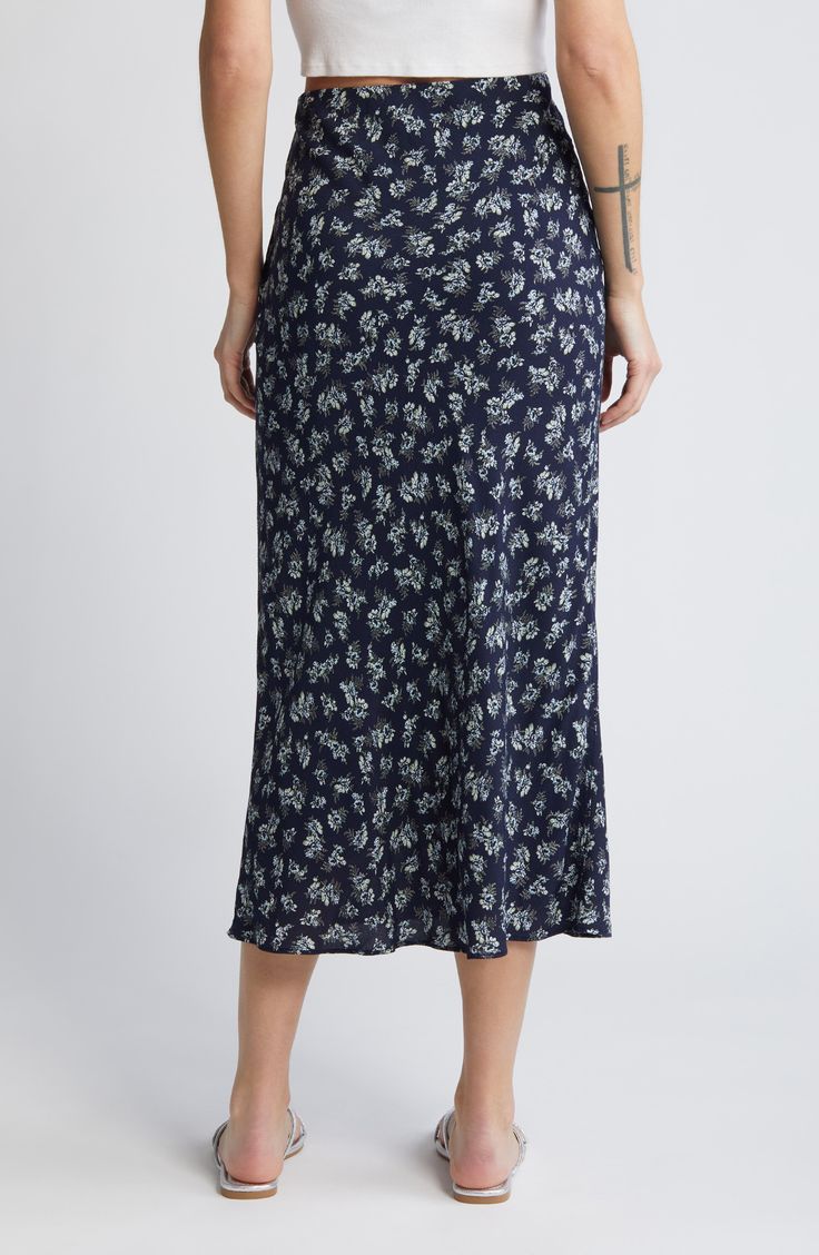 The skirt silhouette of the season is cut to a midi length and ready to top your favorites list. 32" length (size Medium) Lined 100% viscose Machine wash, line dry Imported Non-stretch Summer Midi Skirt, Summer Midi-length Bias Cut Skirt, Non-stretch Mid-rise Blue Skirt, Blue Mid-rise Cotton Skirt, Patterned Midi Skirt, Non-stretch Floral Print Midi Skirt, Midi Skirt Pattern, Favorites List, Midi Length