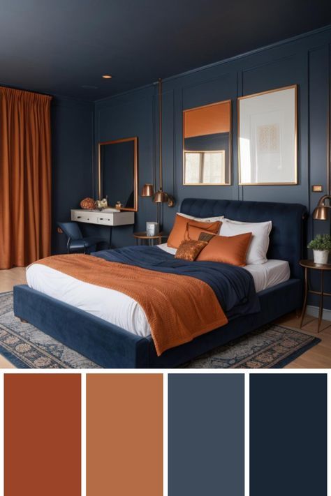 a bedroom with blue walls and orange accents