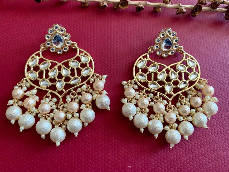 White Kundan Polki Chandbali Earrings. Length: 3 inch Width: 2.5 inch Handcrafted pair of earrings. Gives a traditional look. Can be worn for engagement and wedding parties.   Indulge in it or gift it and watch the compliments flow! It is advisable to store jewelry in a zip lock pouch (air tight pouch), keep away from water perfume and other chemicals and clean it with soft cloth. FREE SHIPPING!! Polki Chandbali, Punjabi Earrings, Kundan Chandbali, Meenakari Earrings, Kundan Jewelry, Water Perfume, Chandbali Earrings, Earrings Indian, Store Jewelry