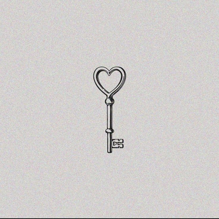 a drawing of a key with a heart on the end is shown in black and white