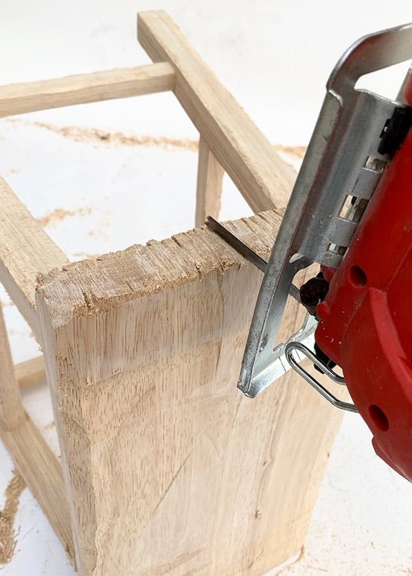 a piece of wood being worked on with a jig saw