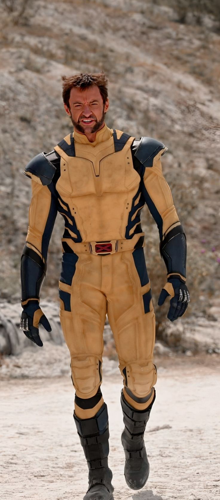 a man dressed as ant - man is walking in the desert