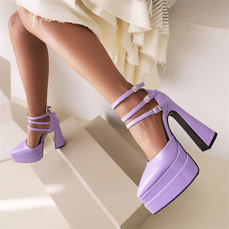 Introducing our purple platform heels! These beautiful shoes are perfect for any occasion. from a night out on the town to a special event. With their pointed toe and ankle strap. they are both stylish and comfortable. They also come in a variety of sizes so you can find the perfect fit. Upper: Patent Leather Lining: PU Outsole: Rubber Toe: Pointed Toe Closure: Buckle Strap Color: Light Blue. Orange. Purple Heel: 14.5cm/5.7'' Platform: 5cm/2'' is_handmade: Yes Trendy Purple Heels For Night Out, Trendy Purple Heels For Party, Chic Purple Heels For Night Out, Chic Purple Heels For A Night Out, Purple Block Heel Shoes For Night Out, Purple Block Heel Heels For Night Out, Trendy Purple Heels With Heel Strap, Purple Ankle Strap Heels For Night Out, Chunky Platform Heels With Pointed Toe For Party