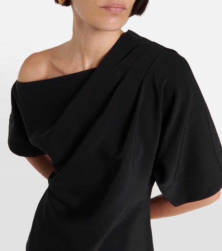 One-shoulder top in black - CO | Mytheresa Ruched Draped Top In Elastane, Ruched Draped Elastane Top, Asymmetrical Ruched Top For Evening, Chic Draped Elastane Tops, Chic Tops With Draped Sleeves, Elegant Ruched Foldover Top, Elegant Off-shoulder Top, Off-shoulder Ruched Top In Elastane, Ruched Off-shoulder Elastane Top