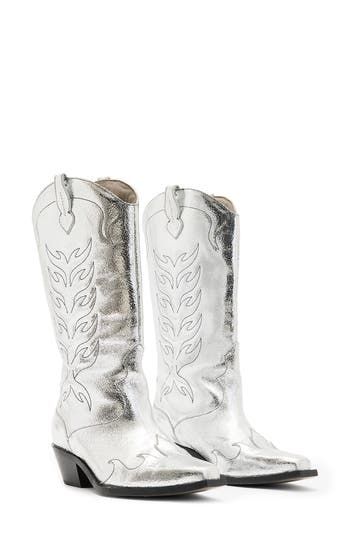 Go west in glamorous style with this metallic leather cowboy boot flaunting stitched details and a pointed toe. 2 1/4" heel 10 1/2" shaft Pull-on style Leather upper and lining/synthetic sole Made in Portugal Silver Western Boots With Snip Toe, Go West, Glamorous Style, Leather Cowboy Boots, Cowboy Boots Women, Cowboy Boot, Metallic Leather, All Saints, Boot Shoes Women