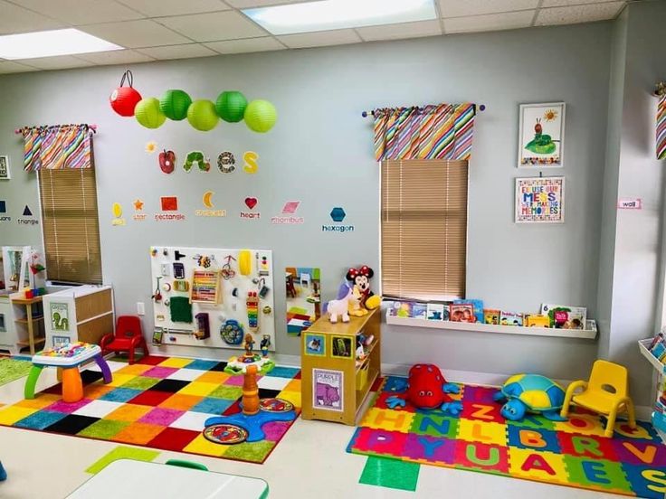 a child's playroom with toys and decorations