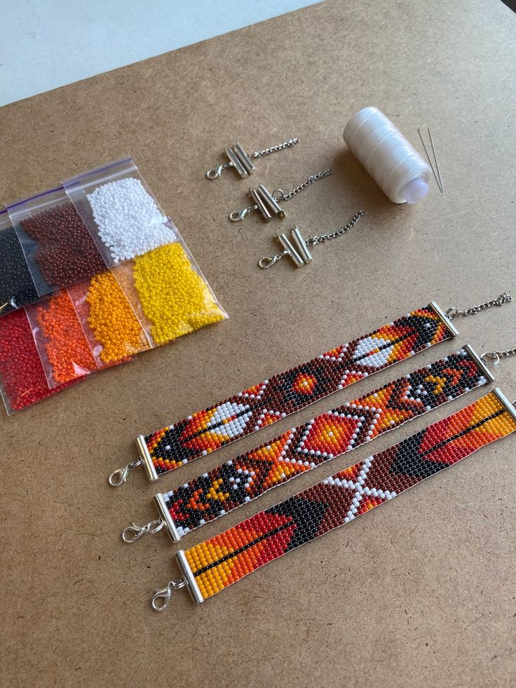 beaded bracelets and other items laid out on a table