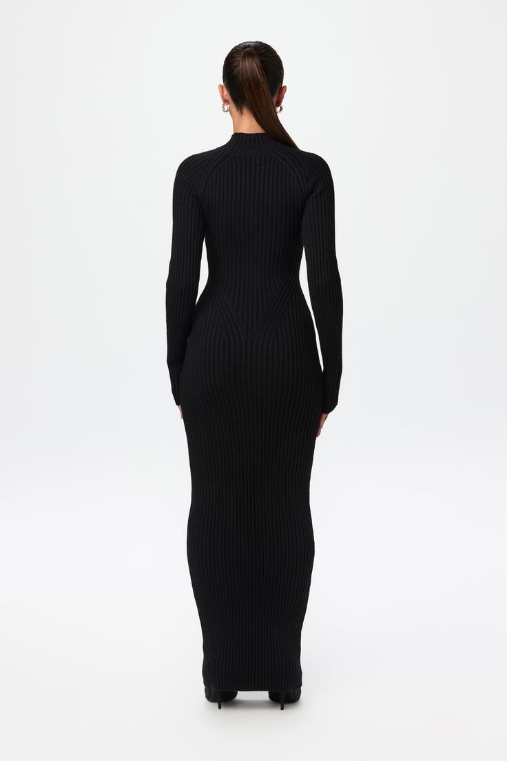 Our soft-to-the-touch ribbed-knit sweater maxi dress is designed with a turtleneck, long fitted sleeves, and a playful ribbed design and v-waist to accentuate your shape. Pair with your favorite flats, boots or heels. Knits Collection Import 52% Viscose, 27% Polyester, 21% Nylon Model wears size XS True to size Ribbed Stretch Maxi Dress, Stretch Ribbed Maxi Dress, Sleek Ribbed Dress For Fall, Sleek Ribbed Fall Dress, Ribbed Maxi Dress For Work, Chic Long Ribbed Sweater Dress, Fitted Ribbed Maxi Dress, Ribbed Fitted Maxi Sweater Dress, Fitted Ribbed Maxi Sweater Dress