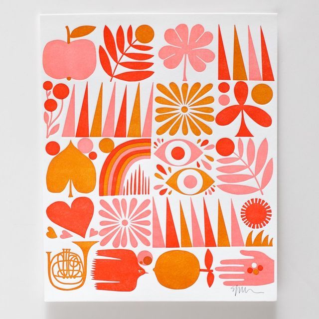 an orange and pink card with different designs on it